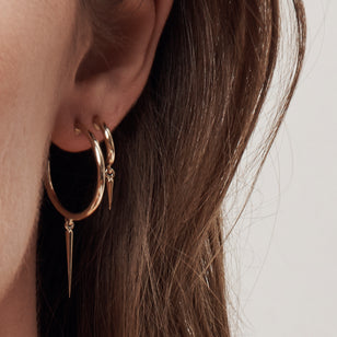 Huggie de capa y daga