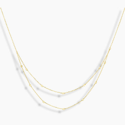 Collar de cuentas de doble diamante