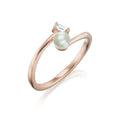 Anillo de perlas de Akoya y diamantes de talla esmeralda